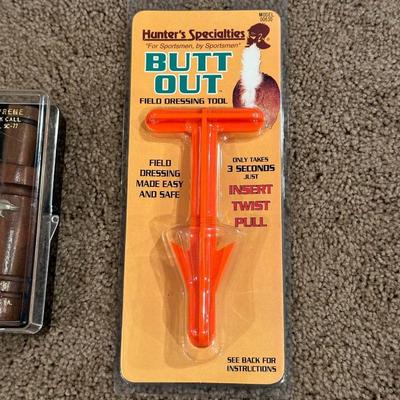 FAULK'S SUPREME DUCK CALL AND "BUTT OUT" FIELD DRESSING TOOL
