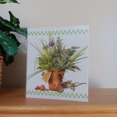 RECIPE BOOK, VARIOUS CANDLES, THROW PILLOWS AND FAUX PLANT