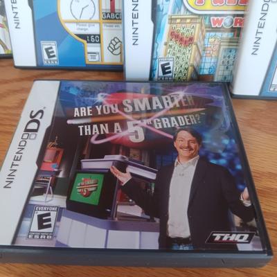 NINTENDO DS LITE PORTABLE GAMING SYSTEM WITH MANY GAMES AND CARRY CASE