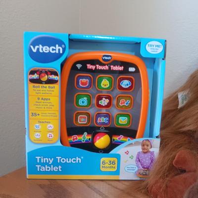 NEW VTECH TINY TOUCH TABLET AND SOME PLUSH ANIMALS