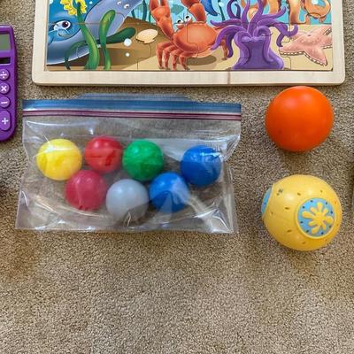 AN ASSORTMENT OF TOYS