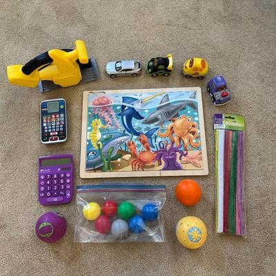 AN ASSORTMENT OF TOYS