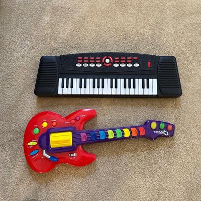 TOY GUITAR AND KEYBOARD