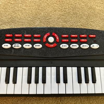 TOY GUITAR AND KEYBOARD