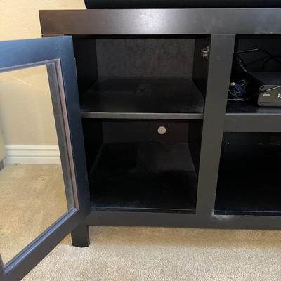 BLACK MEDIA STAND W/2 GLASS FRONT CABINETS