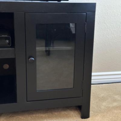 BLACK MEDIA STAND W/2 GLASS FRONT CABINETS