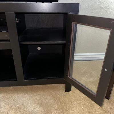 BLACK MEDIA STAND W/2 GLASS FRONT CABINETS