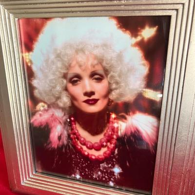 Three Bette Davis pictures beautifully framed