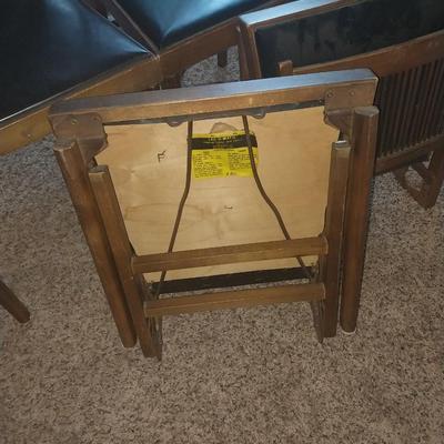 FOUR VINTAGE WOODEN FOLDING CHAIRS