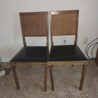 TWO VINTAFE WOODEN FOLDING CHAIRS