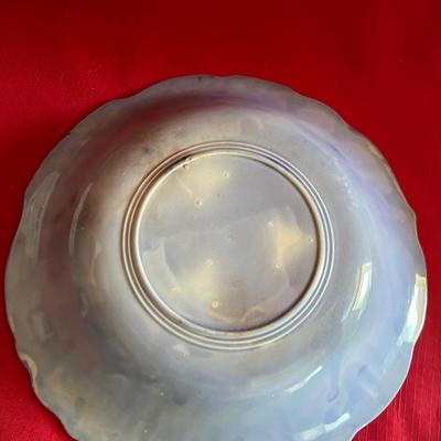 Beautiful, gold, trimmed blue, and white gravy boat along with over variety of saucers, dipping plates, and salad plates