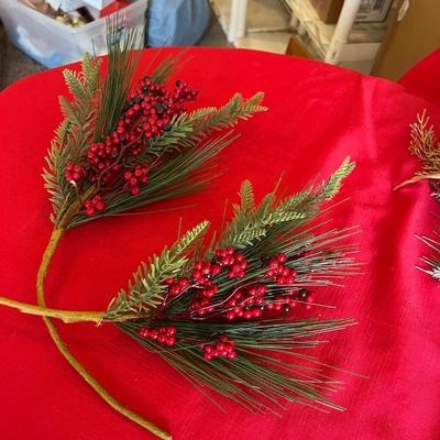 Decorative Christmas decor, flowers poinsettias, along with pinecone wreath