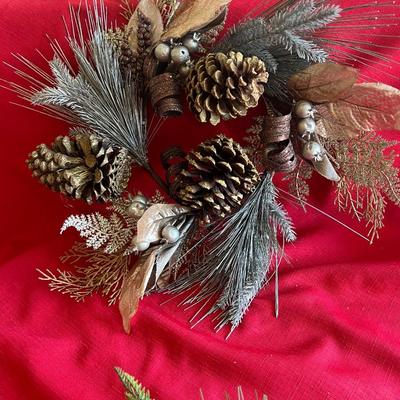 Decorative Christmas decor, flowers poinsettias, along with pinecone wreath