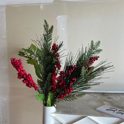Decorative Christmas decor, flowers poinsettias, along with pinecone wreath