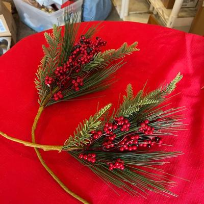 Decorative Christmas decor, flowers poinsettias, along with pinecone wreath