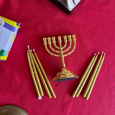 Items for Hanukkah difference, size, candles, solid, brass candle holder, and other decorative items