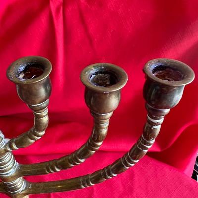 Items for Hanukkah difference, size, candles, solid, brass candle holder, and other decorative items