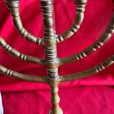 Items for Hanukkah difference, size, candles, solid, brass candle holder, and other decorative items