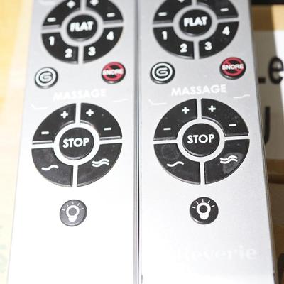 KING SIZE BED. METAL FRAME W/ IVORY COLORED UPHOLSTERED HEADBOARD, REVERIE ADJUSTABLE BASE