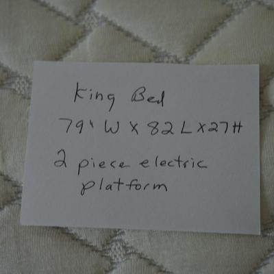 KING SIZE BED. METAL FRAME W/ IVORY COLORED UPHOLSTERED HEADBOARD, REVERIE ADJUSTABLE BASE