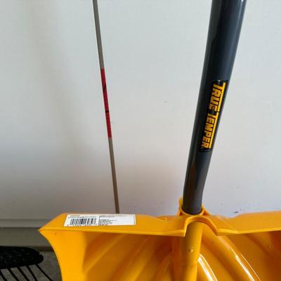 YARD TOOLS AND A WATERING CAN