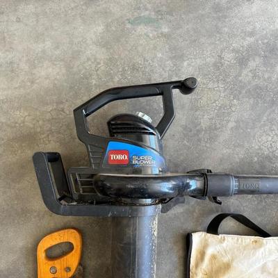 TORO LEAF BLOWER AND VACUUM PLUS A HAND SAW