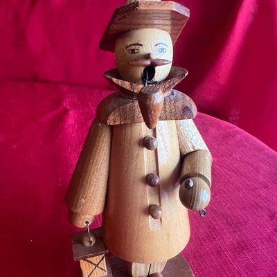 Unique wood carved figurines with pipes one is an incense holder