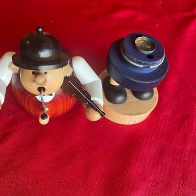 Unique wood carved figurines with pipes one is an incense holder