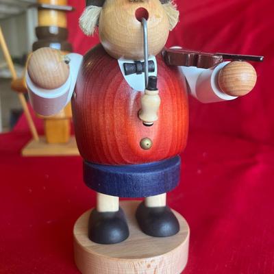 Unique wood carved figurines with pipes one is an incense holder