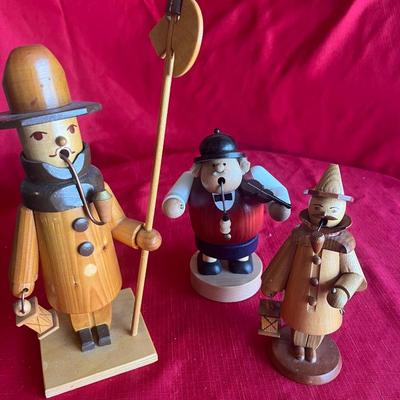 Unique wood carved figurines with pipes one is an incense holder
