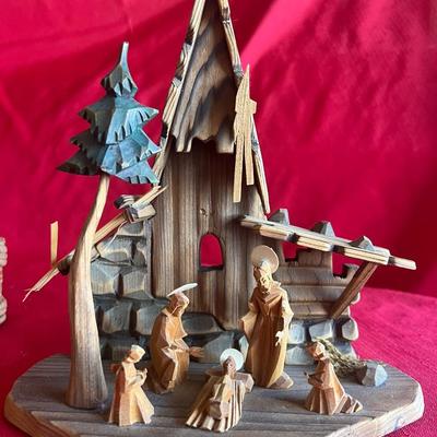Wooden major scene along with three Statues