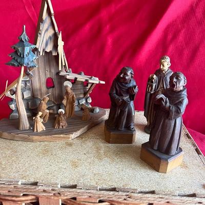 Wooden major scene along with three Statues
