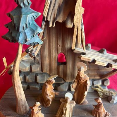 Wooden major scene along with three Statues