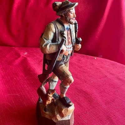 Vintage picture frames with meals along with wood carved windmill picture, and unique Swedish wood carving