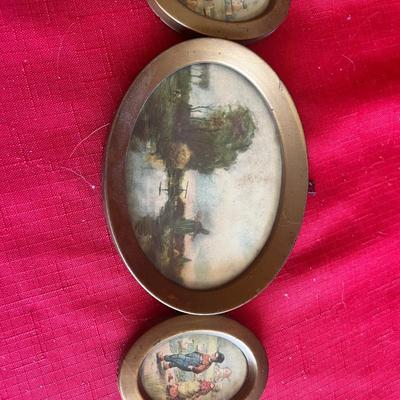 Vintage picture frames with meals along with wood carved windmill picture, and unique Swedish wood carving