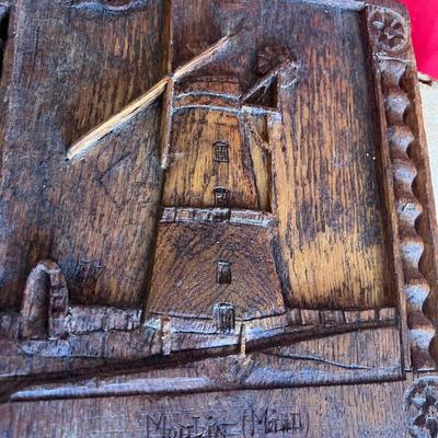 Vintage picture frames with meals along with wood carved windmill picture, and unique Swedish wood carving