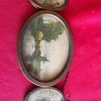 Vintage picture frames with meals along with wood carved windmill picture, and unique Swedish wood carving