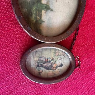 Vintage picture frames with meals along with wood carved windmill picture, and unique Swedish wood carving