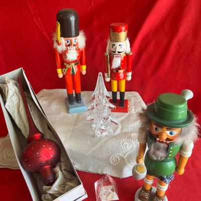 Christmas decor three nutcrackers a Beautiful crystal Christmas tree and paperweight