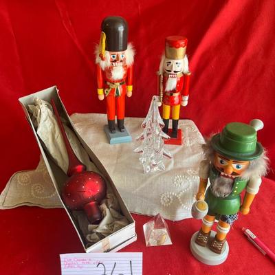 Christmas decor three nutcrackers a Beautiful crystal Christmas tree and paperweight