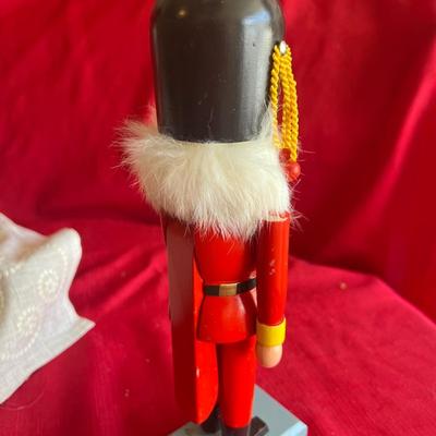 Christmas decor three nutcrackers a Beautiful crystal Christmas tree and paperweight