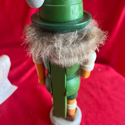 Christmas decor three nutcrackers a Beautiful crystal Christmas tree and paperweight