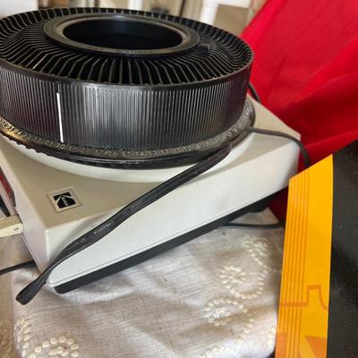 Kodak slide projector with extra slide holder