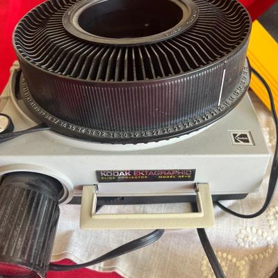 Kodak slide projector with extra slide holder