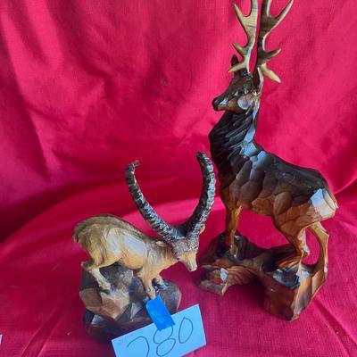 Hand carved buck and mountain goat horns and buck removable mountain goat has one missing tip very unique