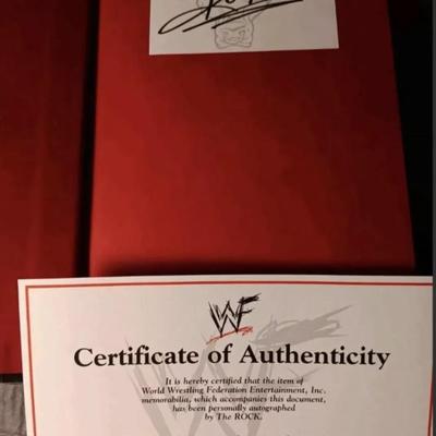 The ROCK SAYS AUTOGRAPHED WWF BOOK