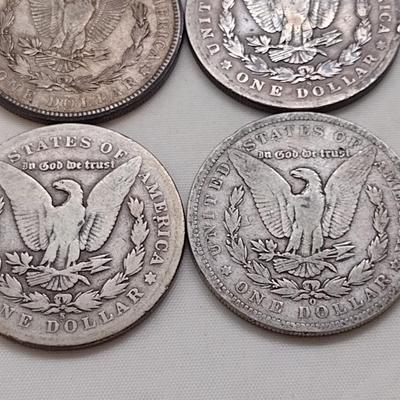 Set of Four U. S. Mint Mogan Silver Dollars Various Dates and Wear Legible Dates (#300)