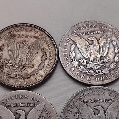 Set of Four U. S. Mint Mogan Silver Dollars Various Dates and Wear Legible Dates (#300)