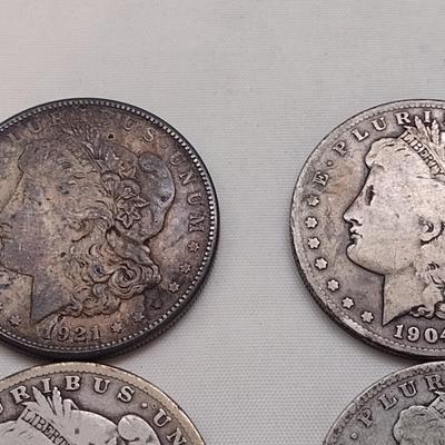 Set of Four U. S. Mint Mogan Silver Dollars Various Dates and Wear Legible Dates (#300)