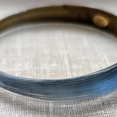 Pair of Alexis Bittar textured Lucite tapered bangle bracelets. Soft blue with gold inside.